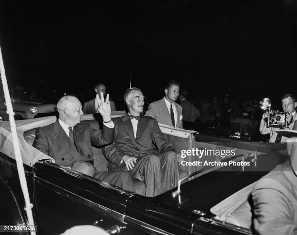 American politician Dwight D Eisenhower, US President, beside American politician and diplomat Christian Herter, Governor of Massachusetts, as they...