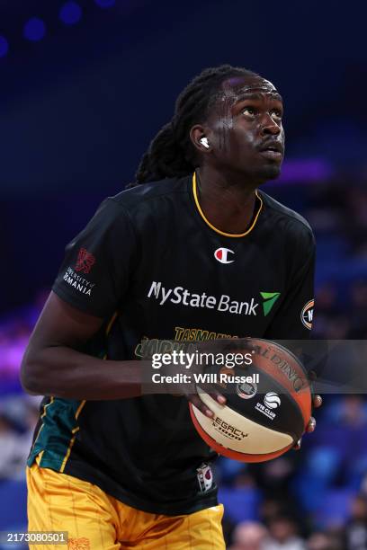 Gorjok Gak of the JackJumpers performs warm up drills before the round one NBL match between Melbourne United and Tasmania Jackjumpers at RAC Arena,...