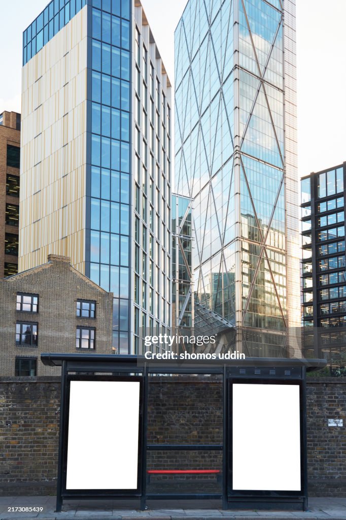Blank bus stop advertising at a street in London