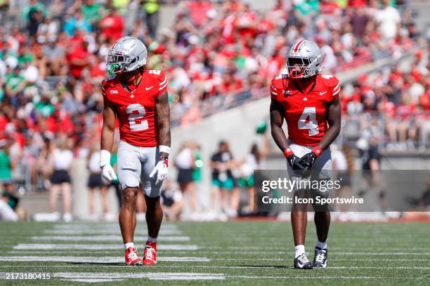 Ohio State Buckeyes wide receiver Emeka Egbuka lines up for a play with teammate Jeremiah Smith during the game against Marshall Thundering Herd and...