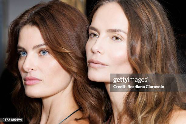 Isabeli Fontana and Natasha Poly are seen backstage at the Roberto Cavalli fashion show during the Milan Womenswear Spring/Summer 2025 on September...