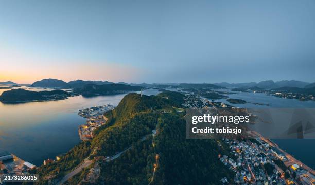 aerial view of ålesund and the fjords at sunset - trondheim stock pictures, royalty-free photos & images