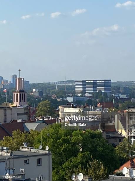 a long view of katowice city and st. casimir garnison church, katowice, poland - katowice stock pictures, royalty-free photos & images