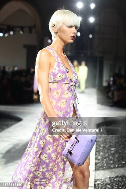 Iris Law walks the runway at the Versace fashion show during the Milan Womenswear Spring/Summer 2025 on September 20, 2024 in Milan, Italy.