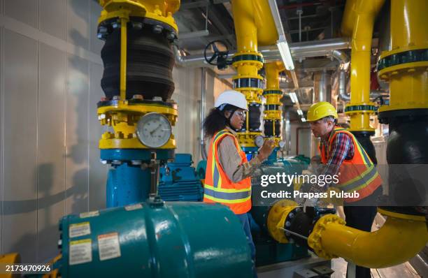 technician engineer working in industrial plant by checking - gas pipes stock pictures, royalty-free photos & images
