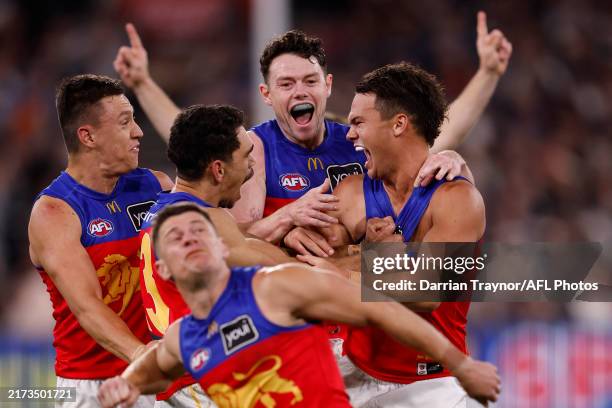 Cam Rayner of the Lions celebrates a goal during the AFL Preliminary Final match between Geelong Cats and Brisbane Lions at Melbourne Cricket Ground,...