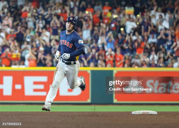 Houston Astros third baseman Alex Bregman rounds the bases after hitting a two-run home run during the MLB game between the Los Angeles Angels and...