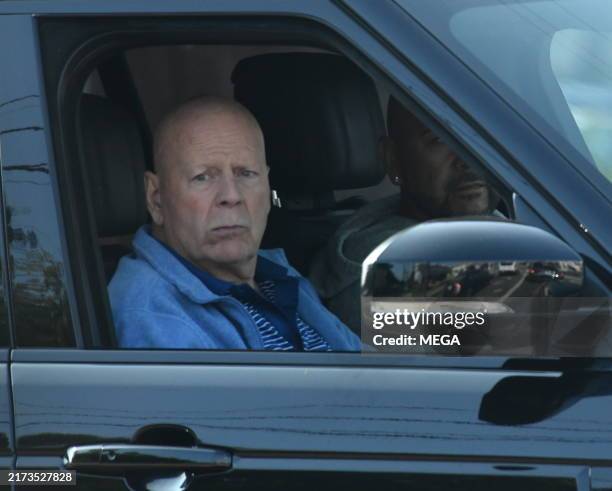 Bruce Willis is seen out in his car on September 21, 2024 in Brentwood, California.