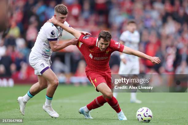 Federico Chiesa of Liverpool is challenged by Alex Scott of AFC Bournemouth during the Premier League match between Liverpool FC and AFC Bournemouth...
