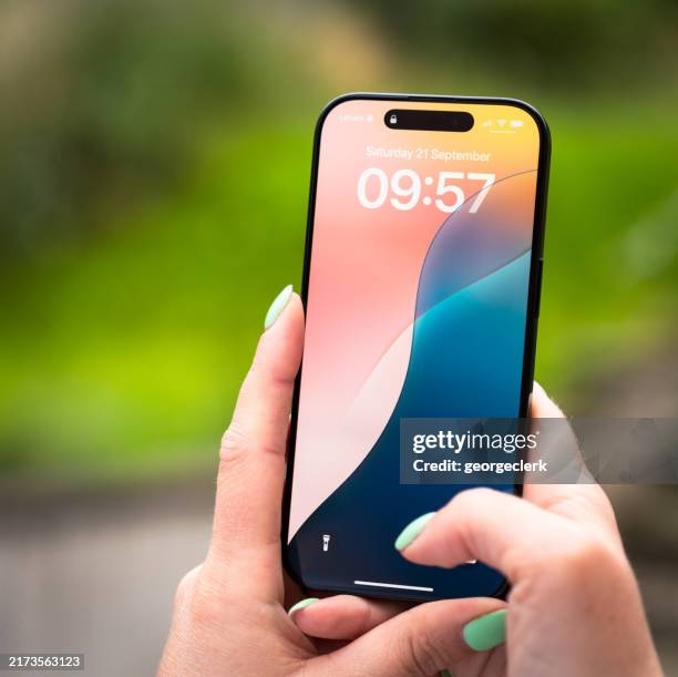 using an iphone 16 pro - incoming call mockup stock pictures, royalty-free photos & images
