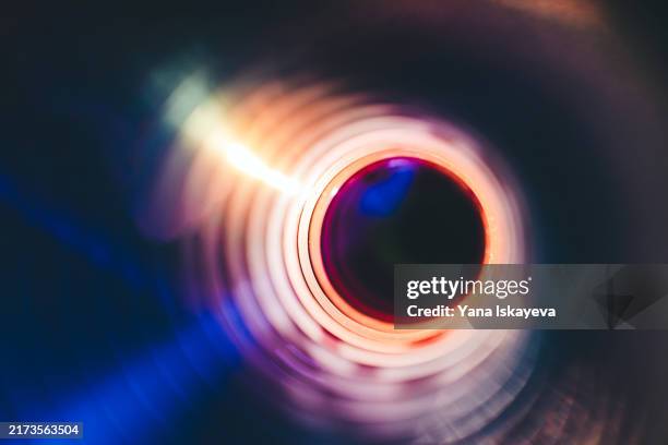 intergalactic journey: black holes and teleports to the unknown - trou noir photos et images de collection
