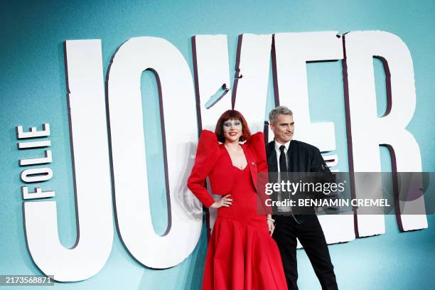 Singer-songwriter and actor Lady Gaga and US actor Joaquin Phoenix pose on the red carpet upon arrival to attend the the UK premiere of "Joker: Folie...