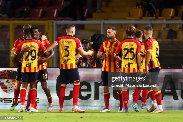 Patrick Dorgu of Lecce celebrates with his teammates after scoring his team's opening goal during the Serie A match between Lecce and Parma at Stadio...