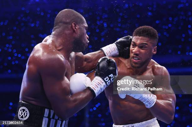 Daniel Dubois punches Anthony Joshua during the IBF World Heavyweight Title fight between Daniel Dubois and Anthony Joshua, on the Riyadh Season -...