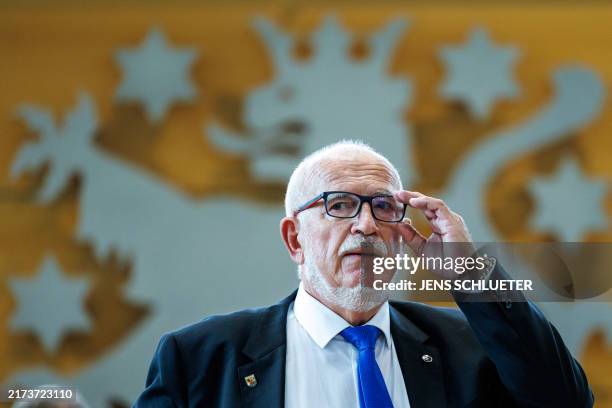 Juergen Treutler from the far-right Alternative for Germany party, who acts as chairman by seniority of the Thuringian state parliament, is pictured...