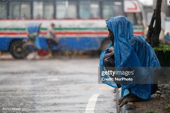 Homeless While Raining A homeless man wears a plastic sheet during rainfall in Dhaka,... News ...