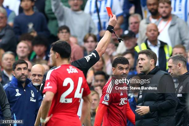 Fabian Huerzeler, Manager of Brighton & Hove Albion, receives a red card from Referee Robert Jones during the Premier League match between Brighton &...