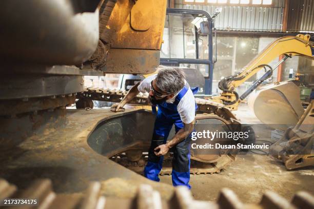 tools in use - construction machinery stock pictures, royalty-free photos & images