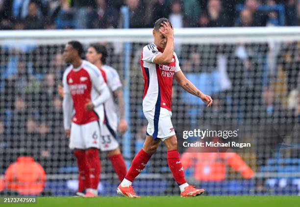 Leandro Trossard of Arsenal leaves the pitch after being shown a red card during the Premier League match between Manchester City FC and Arsenal FC...
