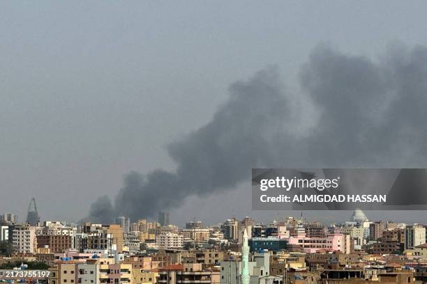 Smoke billows during air strikes in central Khartoum as the Sudanese army attacks positions held by the paramilitary Rapid Support Forces throughout...