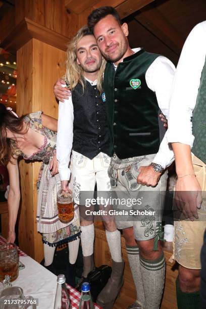 Bill Kaulitz, singer of Tokyo Hotel, and Marc Eggers during Oktoberfest 2024 at Schützen-Festzelt on September 26, 2024 in Munich, Germany.