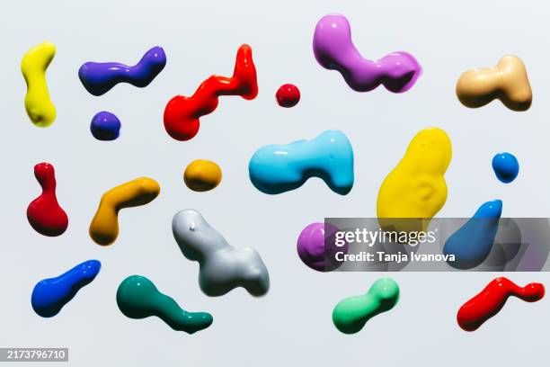 set of multicolored smears and drops of cosmetic liquid or nail polish on white background - acrylic painting stock pictures, royalty-free photos & images