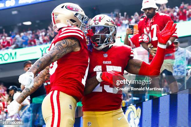 Jauan Jennings of the San Francisco 49ers celebrates a touchdown with teammate Ronnie Bell of the San Francisco 49ers against the Los Angeles Rams...