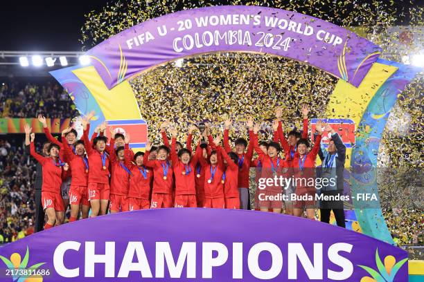 Chae Un Yong of Korea DPR and teammates lift the trophy after winning the FIFA U-20 Women's World Cup Colombia 2024 Final match between Korea DPR and...