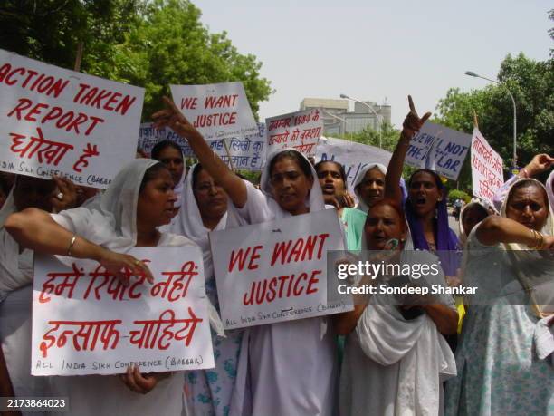1984 Riots Crying widowed victims of the anti-Sikh riots of 1984, which took ...