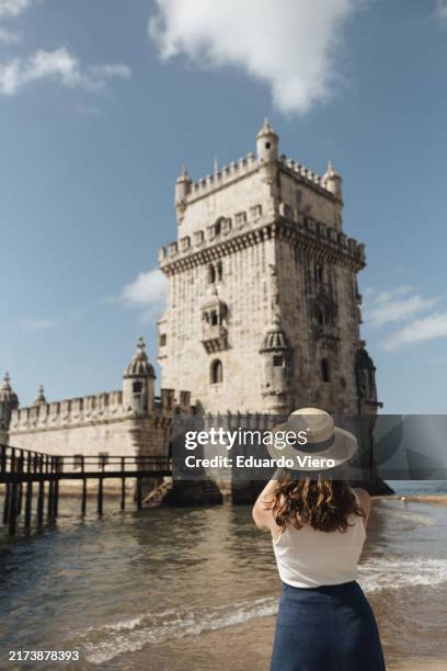 capturing moments by belém tower, lisbon - belém lisbon stock pictures, royalty-free photos & images
