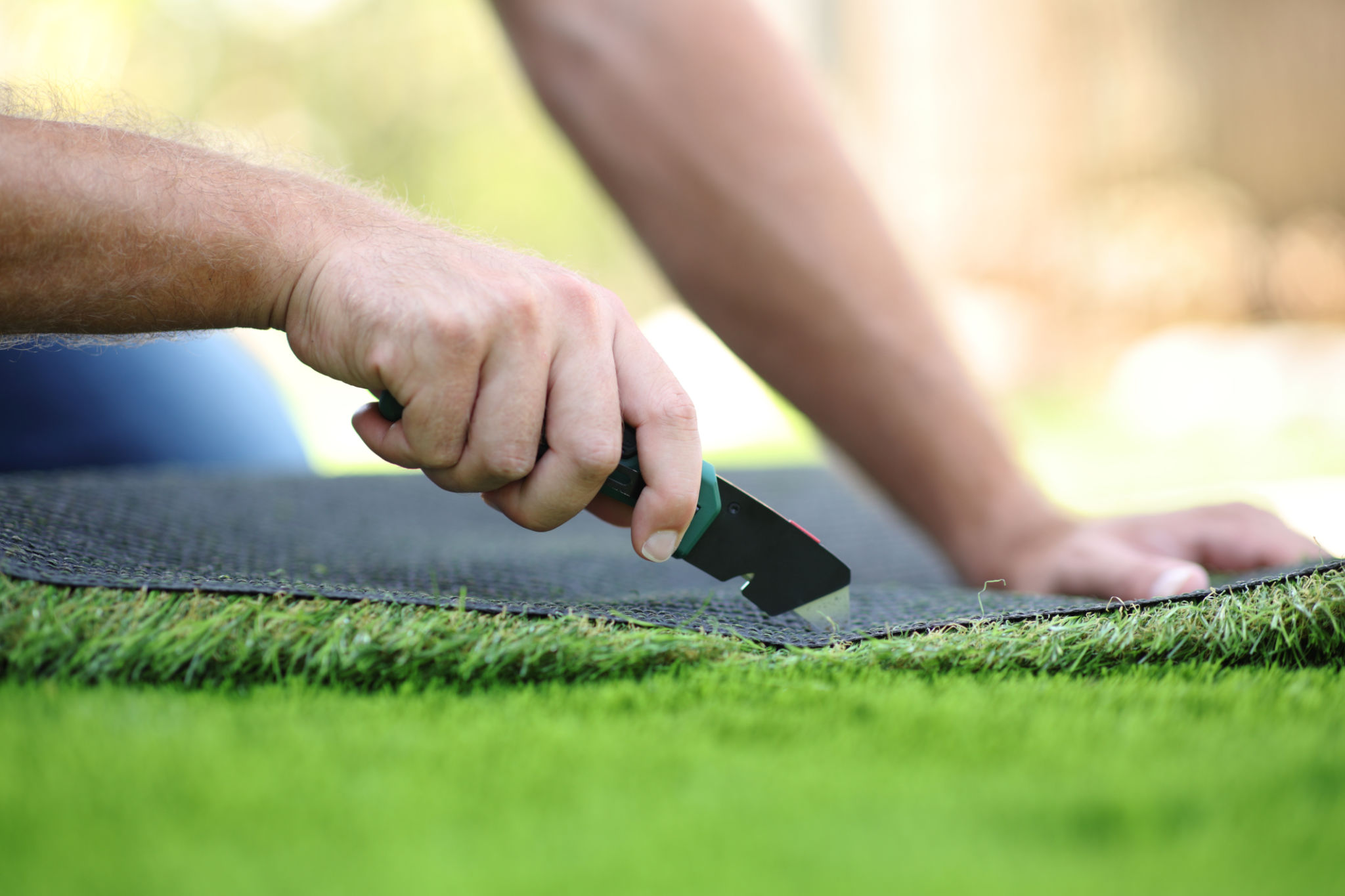 installing fake grass