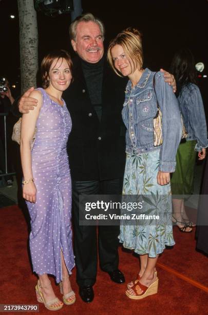 American actor Robert Wagner putting his arms around stepdaughter Natasha Wagner and daughter Courtney Wagner at the premiere of 'High Fidelity' at...