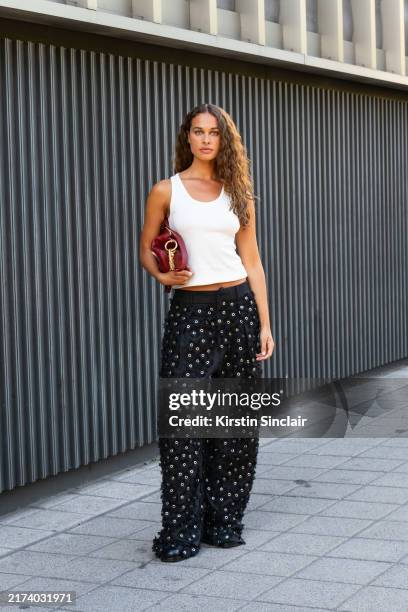 Sarah Lysander Svendby Carter wears Burberry outside the Burberry show during London Fashion Week September 2024 on September 16, 2024 in London,...