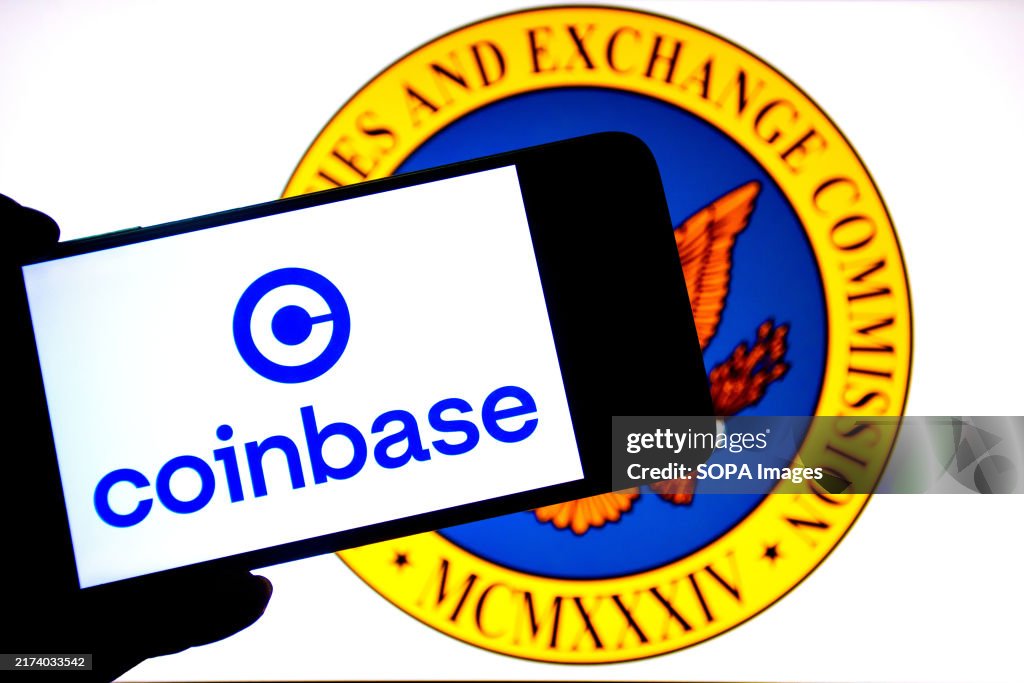 In this photo illustration, a Coinbase logo seen displayed...