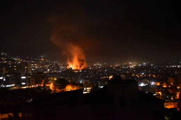 The Israeli military conducts an airstrike on the Dahieh area located south of Beirut, Lebanon, resulting in plumes of smoke rising from the site in...