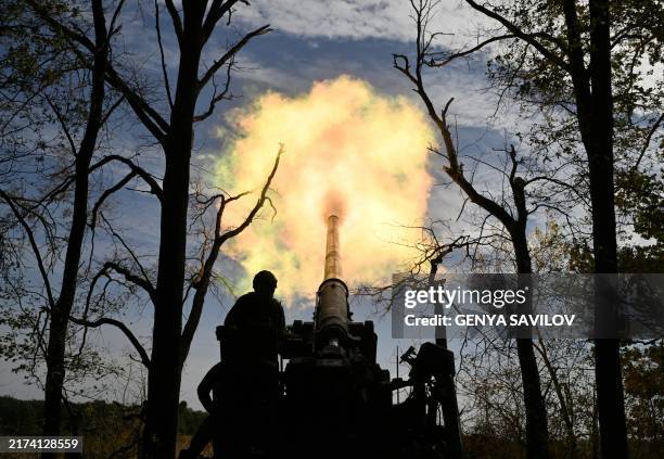 Ukrainian servicemen of the 43 Artillery Brigade fire a 2S7 Pion self-propelled cannon towards Russian positions at a front line in the Donetsk...