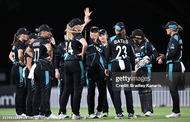 Fran Jonas of New Zealand celebrates with team mates after taking the wicket of Ellyse Perry of Australia during game three of the Women's T20...