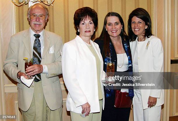 Publicist Julian Meyers, June DeMaria, Lynne Weaver and Stacy Phillips attend the Women of Los Angeles "Hope Is A Woman" luncheon at The Four Seasons...