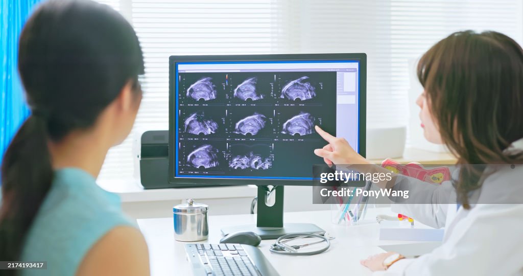 Doctor explain woman Uterus ultrasound