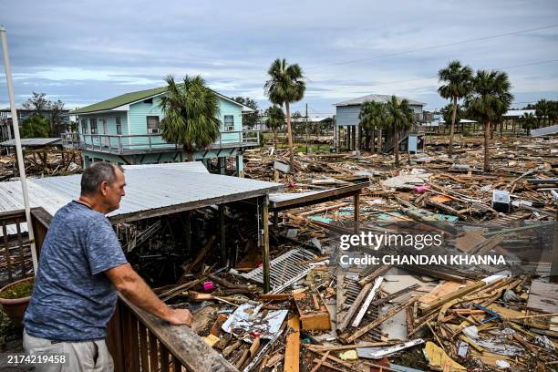 David Hester inspects damages of his house after Hurricane Helene made landfall in Horseshoe Beach, Florida, on September 28, 2024. At least 44...