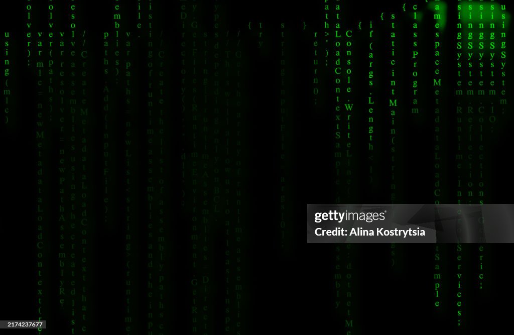 Green lines of code on black background create effect of digital rain, matrix code.