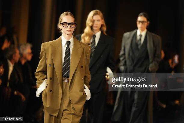 Models walk the runway during the Saint Laurent Womenswear Spring-Summer 2025 show as part of Paris Fashion Week on September 24, 2024 in Paris,...