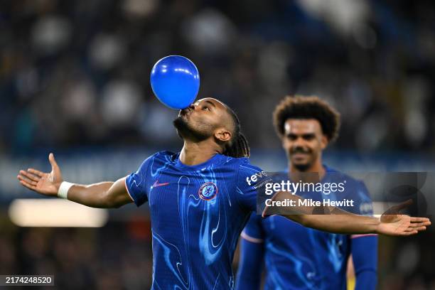 Christopher Nkunku of Chelsea celebrates scoring his team's fifth goal, and completing his hattrick by blowing up a ballon during the Carabao Cup...