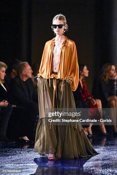 Model walks the runway during the Saint Laurent Womenswear Spring-Summer 2025 show as part of Paris Fashion Week on September 24, 2024 in Paris,...