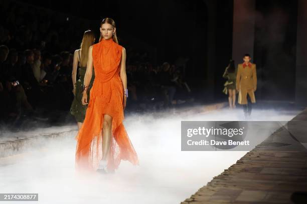 Models walk the runway at the McQueen Spring/Summer 2025 show during Paris Fashion Week on September 28, 2024 in Paris, France.
