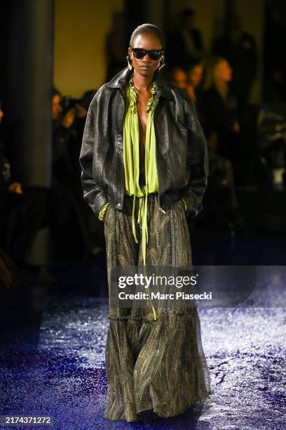 Model walks the runway during the Saint Laurent Womenswear Spring-Summer 2025 show as part of Paris Fashion Week on September 24, 2024 in Paris,...