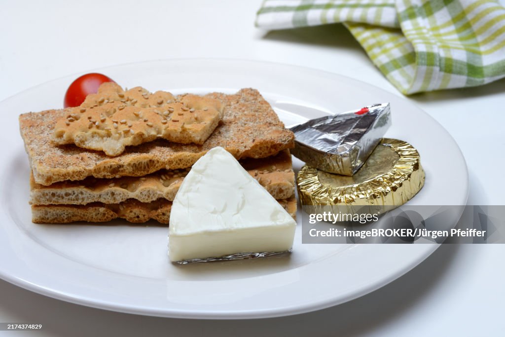 Processed cheese on crispbread, opened and packed