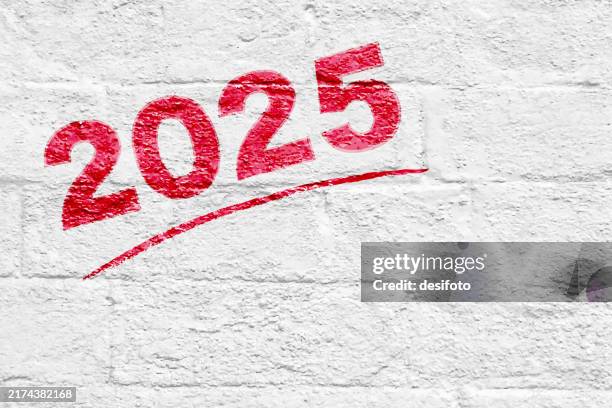 underlined red maroon bright vibrant text 2 0 2 5 painted as graffiti for 2025 new year over white coloured brick wall rough rustic weathered wall vector backgrounds - underline vector stock illustrations