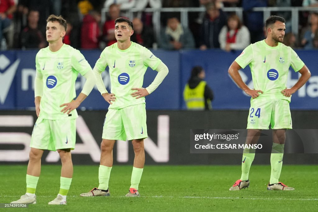 TOPSHOT-FBL-ESP-LIGA-OSASUNA-BARCELONA