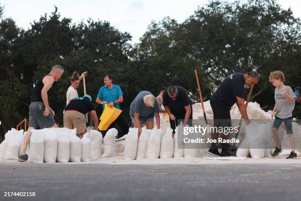 Residents fill sandbags at Helen Howarth Park ahead of the possible arrival of Hurricane Helene on September 25, 2024 in Pinellas Park, Florida....